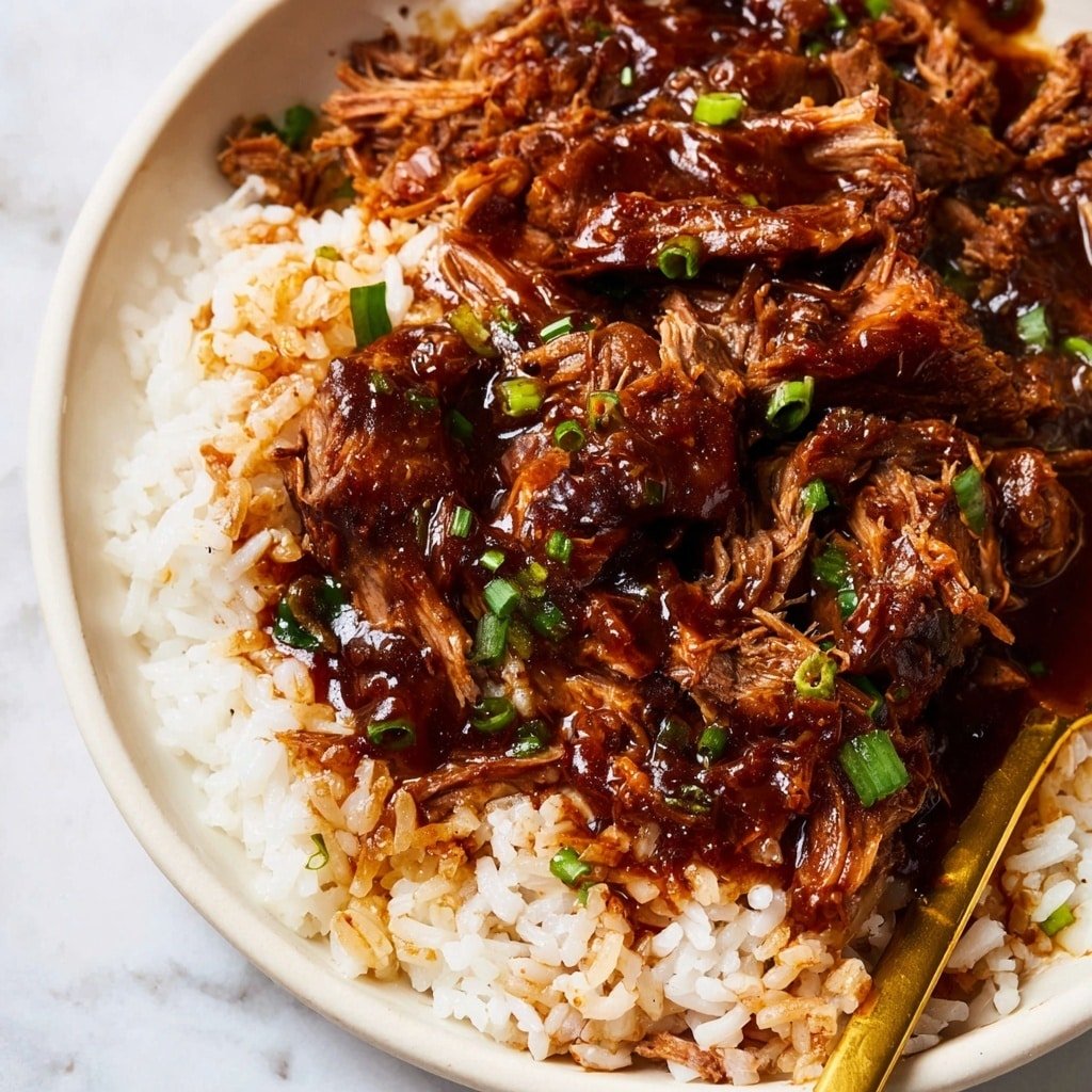 The image shows a white bowl filled with a dish made of two main layers. The bottom layer is plain white rice, fluffy with separate grains clearly visible, covering the entire base of the bowl. On top, there is a layer of dark brown braised pork pieces with a shiny glaze, some chunks showing tender, pulled texture. Mixed within the pork are small bits of cooked vegetables in a dark sauce, adding a rich color contrast. Bright green sliced scallions are scattered over the pork, adding freshness and a pop of color. The bowl sits on a white marbled surface, and a golden spoon is partly visible at the top right corner. photo taken with an iphone --ar 4:5 --v 7